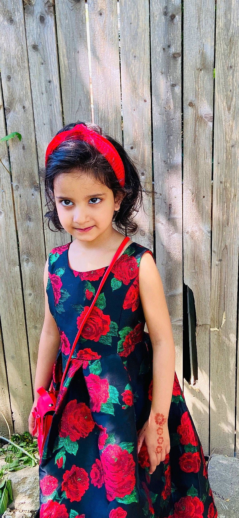 Layan is registered to the contest to win money with this photo: baby_toddler_clothing, black_hair, child, chin, clothing, day_dress, dress, eye, face, fashion, happy, head, joy, magenta, person, pink, plant, red, skin, sleeve