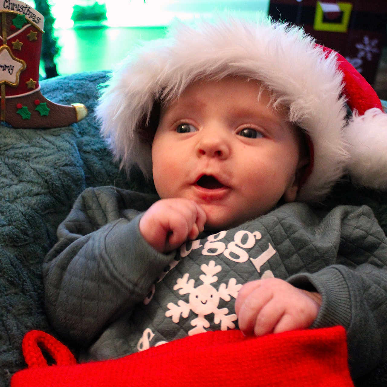 Thomas joined the competition — help win amazing prizes! baby, bodypart, bonnet, cap, clothing, couch, cushion, face, finger, footwear, furniture, hand, hat, head, knitwear, person, photography, portrait, shoe, sweater