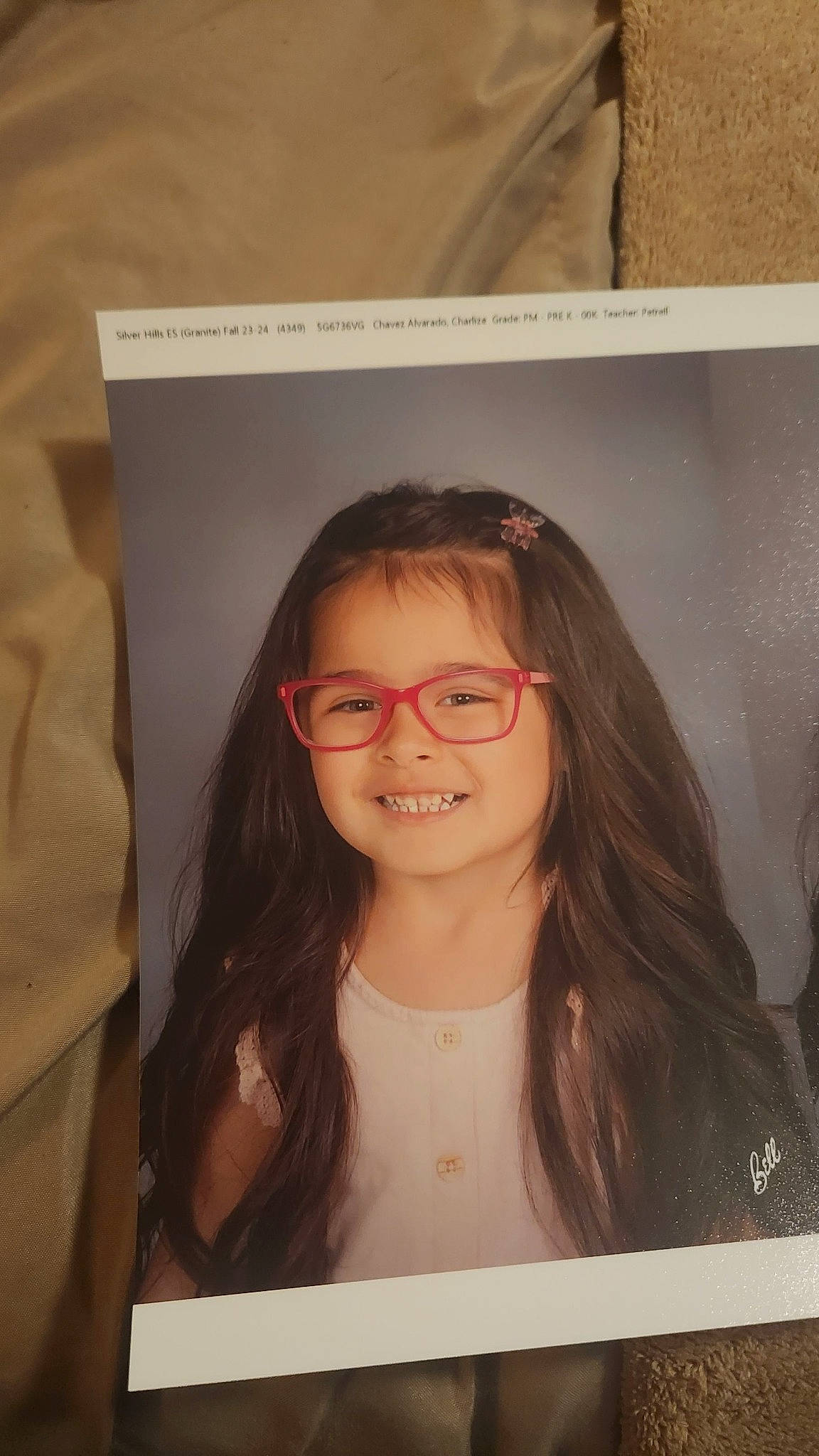 Charlize is registered to the contest to win money with this photo: art, blond, brown_hair, cheek, chin, eyebrow, eyelash, eyewear, forehead, fun, glasses, happy, iris, jaw, joy, layered_hair, lip, long_hair, nose, person