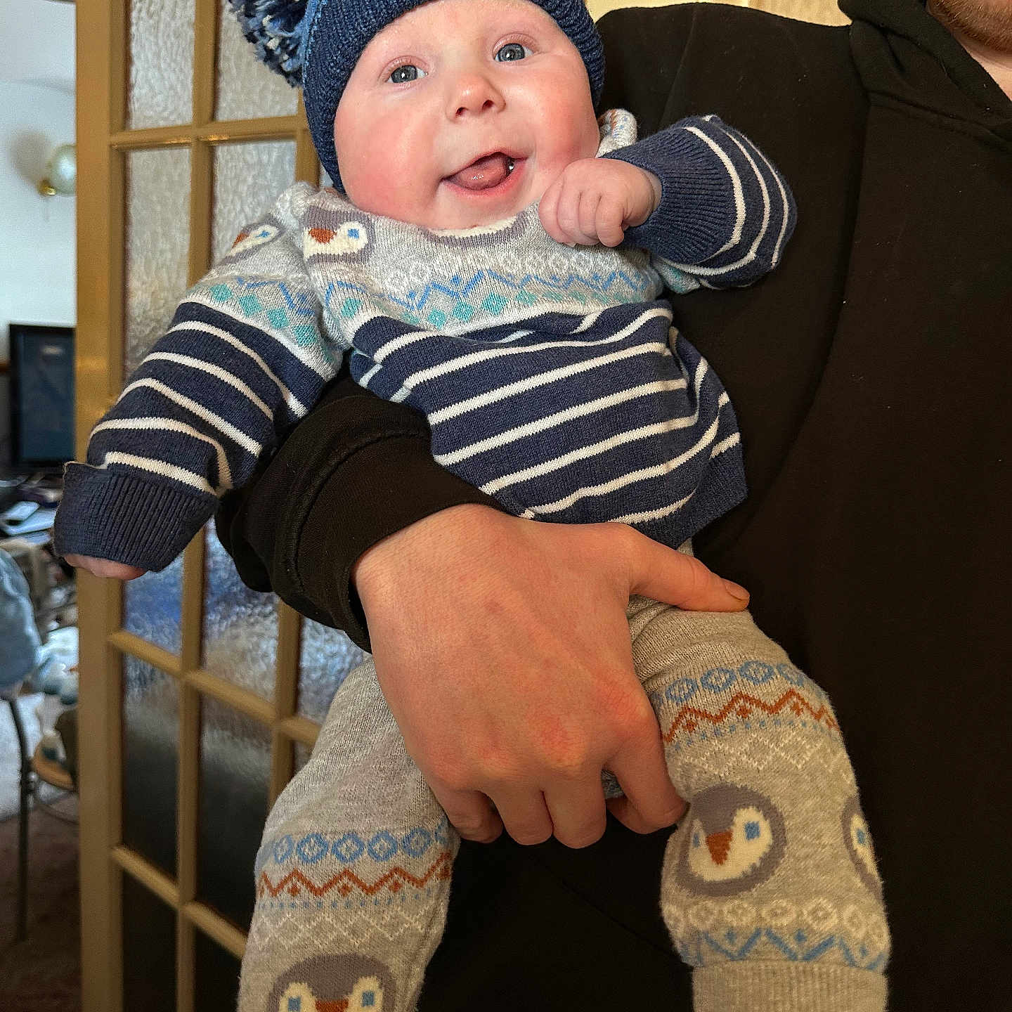 Grayson joined the competition — help win amazing prizes! baby, beanie, bonnet, cap, clothing, computerhardware, door, electronics, face, hardware, hat, head, hosiery, knitwear, pants, person, photography, portrait, sock, sweater