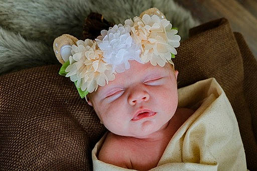 Mckenna is registered to the contest to win money with this photo: artificial_flower, baby, baby_sleeping, baby_toddler_clothing, bridal_accessory, cap, costume_hat, flower, hair_accessory, happy, head, headband, headgear, headpiece, headwear, jewellery, person, petal, pink, plant