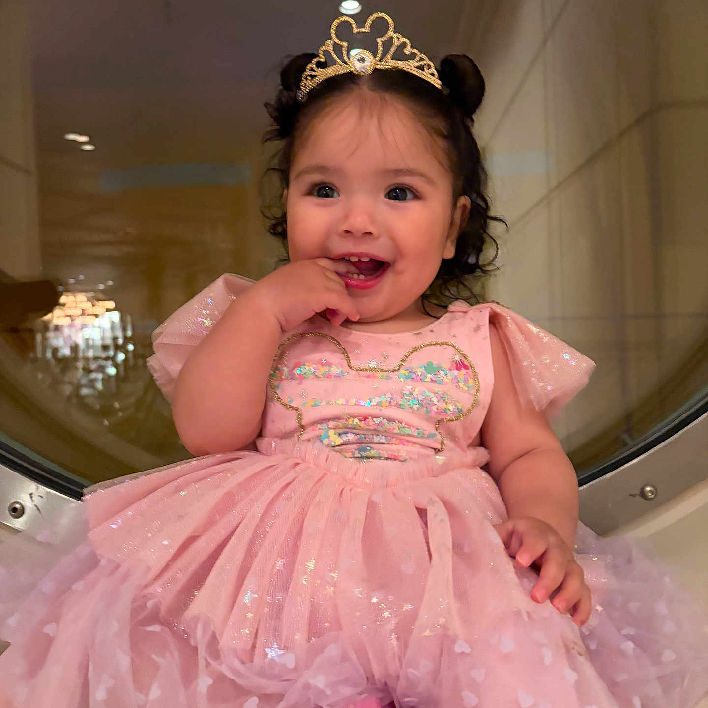 Zarali is registered to the contest to win money with this photo: toddler, child, girl, dress, pink, tiara, smiling, happy, indoor, curly_hair, sitting, sparkle, cute, fashion, portrait, baby, playful, young_child, joyful, person