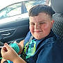 Malachi joined the competition — help win amazing prizes! blue_shirt, boy, car, casual_clothing, child, daylight, dessert, eating, food, happy, indoors, interior, portrait, seat, seatbelt, smile, spoon, vehicle, window, young