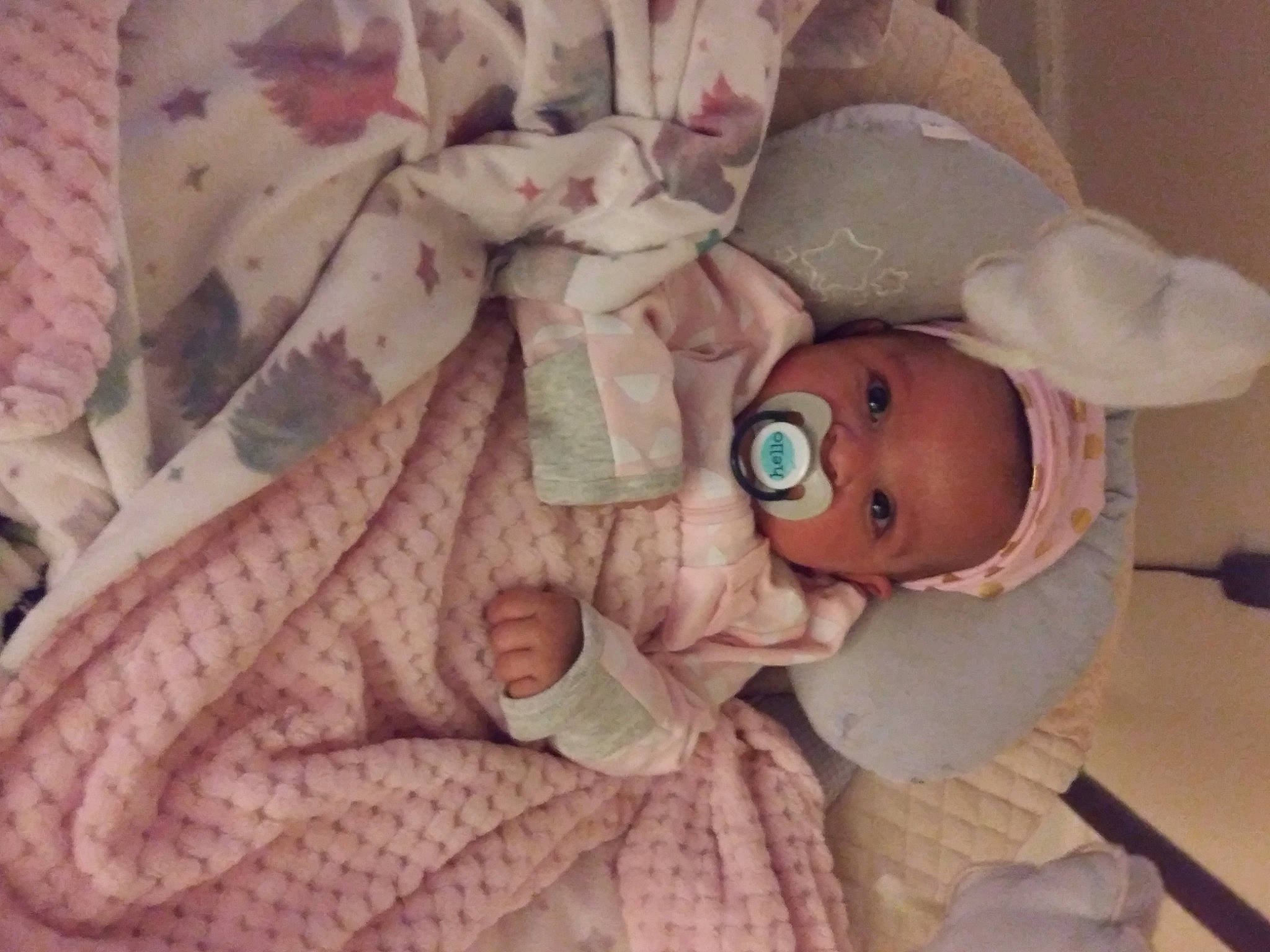 Caydence is registered to the contest to win money with this photo: baby, bedtime, birth, child, doll, person, pink, toy
