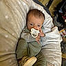 Waylon joined the competition — help win amazing prizes! baby, pacifier, blanket, clothing, footwear, shoes, hand, face, infant, person, indoors, plush, pattern, star, cozy, cute, resting, newborn, soft, sleepwear