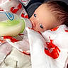Waylon joined the competition — help win amazing prizes! baby, infant, bottle, milk, blanket, fox_pattern, car_seat, face, sleepy, feeding, cozy, newborn, child, clothing, comfort, rest, cute, portrait, indoor, safety_warning