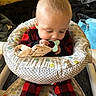 Waylon joined the competition — help win amazing prizes! baby, baby_seat, black_clothing, child, cozy, cute, fabric, face, hand, head, indoor, infant, pattern, person, plaid, red_clothing, sitting, soft_toy, teething_toy, warm_lighting