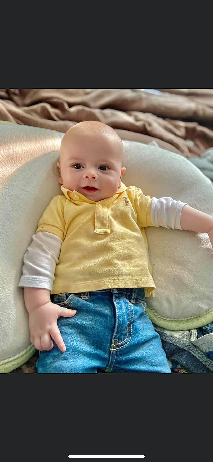 Houston joined the competition — help win amazing prizes! baby, baby_toddler_clothing, cheek, child, comfort, dress, eye, facial_expression, finger, happy, human_body, jeans, mammal, orange, person, product, skin, sleeve, smile, toddler