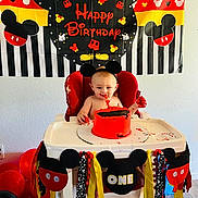 Jace is registered to the contest to win money with this photo: baby, birthdaycake, birthdayparty, blowingoutcandles, cake, candle, chair, clothing, cream, dessert, food, fun, glove, party, people, person, pingpong, pingpongpaddle, racket, sport