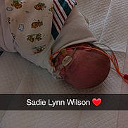 Sadie joined the competition — help win amazing prizes! newborn, baby, infant, hospital, medical_tube, blanket, sleeping, quilted_mattress, face, person, healthcare, monitoring_equipment, nasal_tube, lying_down, wrapped, cute, fragile, child, hospital_bed, peaceful