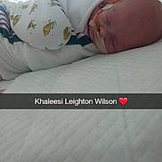 Khaleesi joined the competition — help win amazing prizes! baby, newborn, sleeping, blanket, hospital, nasal_tube, bed, white, face, child, resting, indoors, comfort, healthcare, infant, person, closeup, peaceful, soft, wrapped