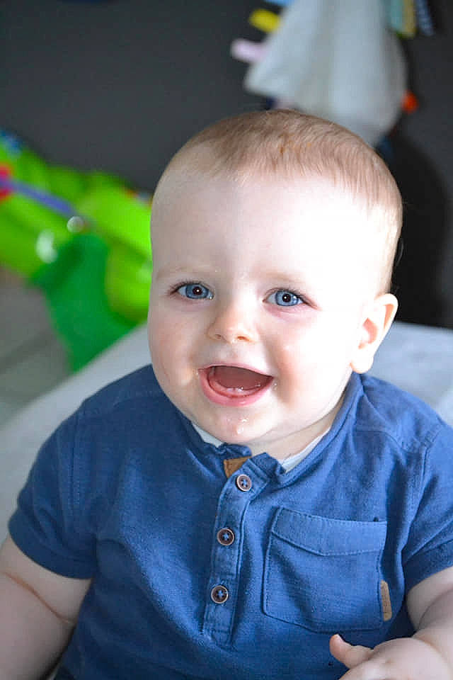 Estheban participe au concours pour gagner de l'argent avec cette photo : baby, baby_laughing, baby_products, baby_toddler_clothing, button, cheek, child, ear, humour, iris, laugh, lip, mouth, overall, person, skin, toddler, tongue, tooth