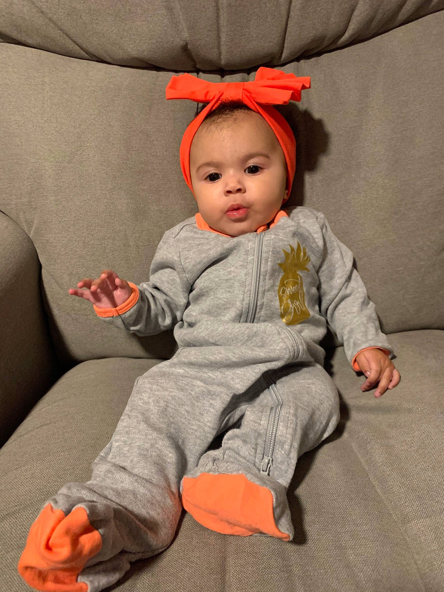 Kiyah is registered to the contest to win money with this photo: baby, child, ear, person, sitting, skin, sleeve, toddler