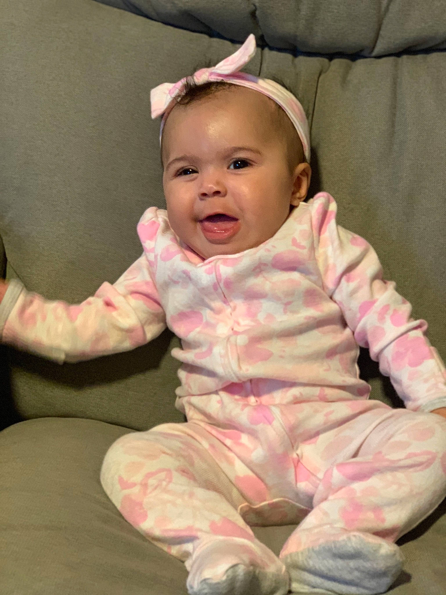 Kiyah is registered to the contest to win money with this photo: baby, baby_products, baby_toddler_clothing, cheek, child, person, pink, product, sitting, skin, sleeve, toddler
