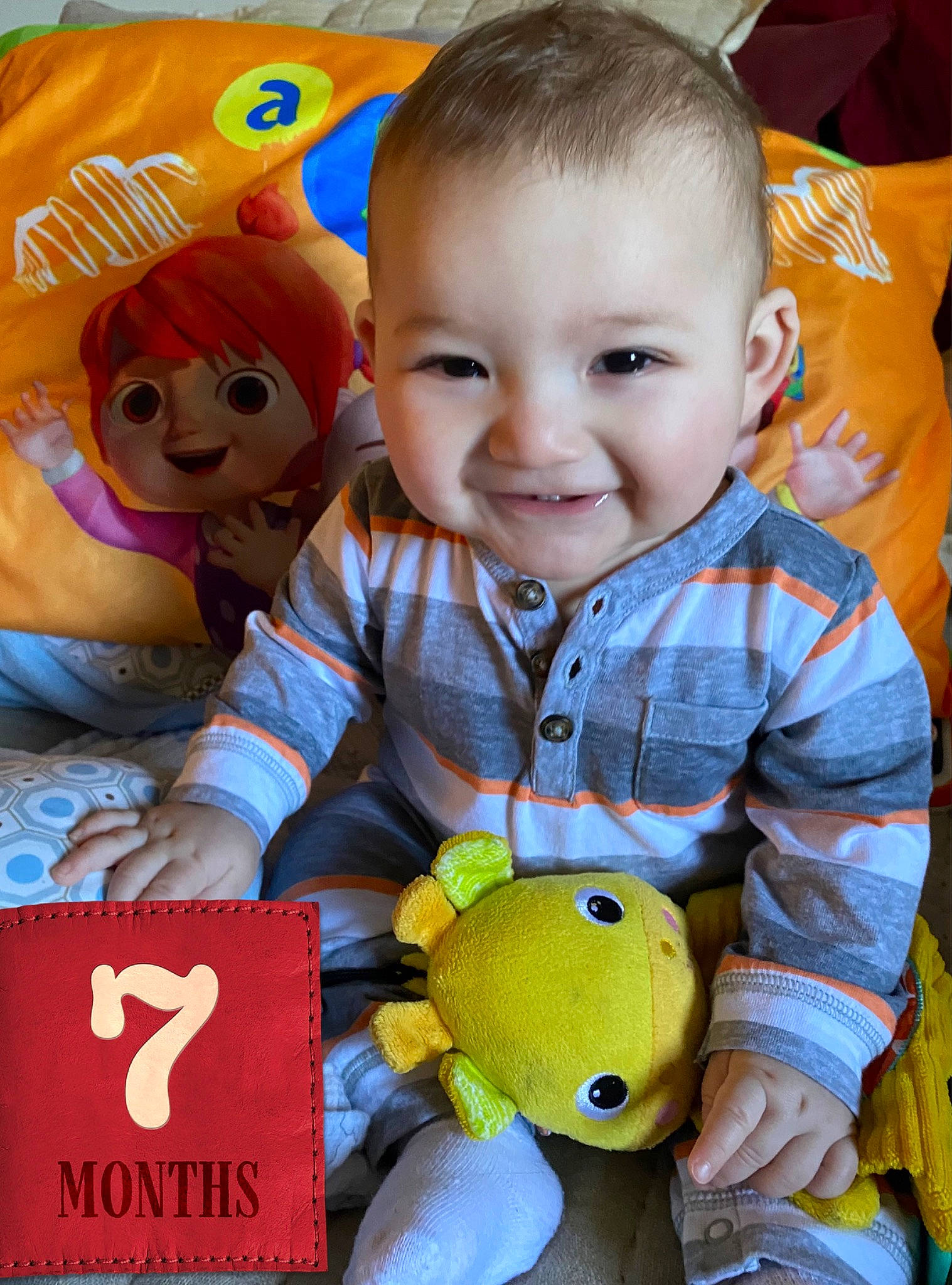 Anders joined the competition — help win amazing prizes! arm, baby, baby_playing_with_toys, baby_toddler_clothing, cheek, facial_expression, finger, happy, head, joy, nose, orange, organ, person, photograph, product, skin, smile, textile, toddler