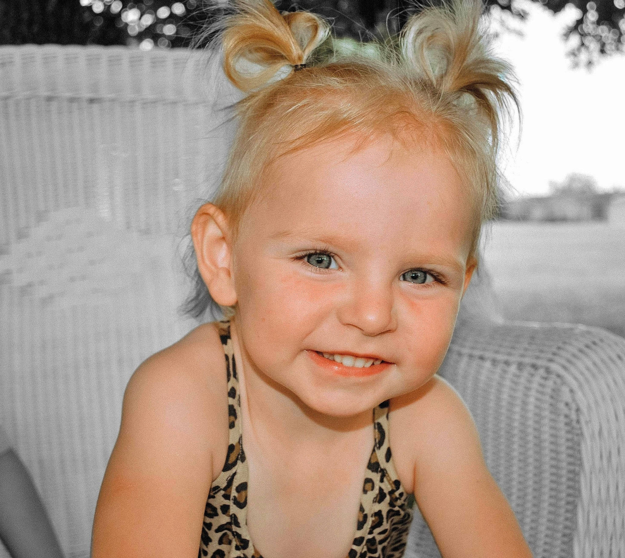 Sage is registered to the contest to win money with this photo: baby_toddler_clothing, blond, brown_hair, cheek, child, ear, eye, eyebrow, eyelash, flash_photography, grass, happy, head, headpiece, iris, jewellery, joy, neck, person, skin