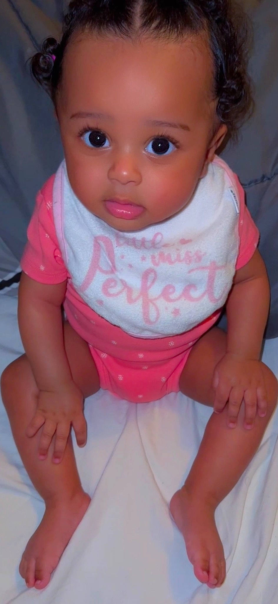 Aleenah joined the competition — help win amazing prizes! baby_toddler_clothing, cheek, chin, gesture, hand, human_body, iris, joint, leg, lip, mouth, neck, nose, organ, person, pink, shoulder, skin, sleeve, standing