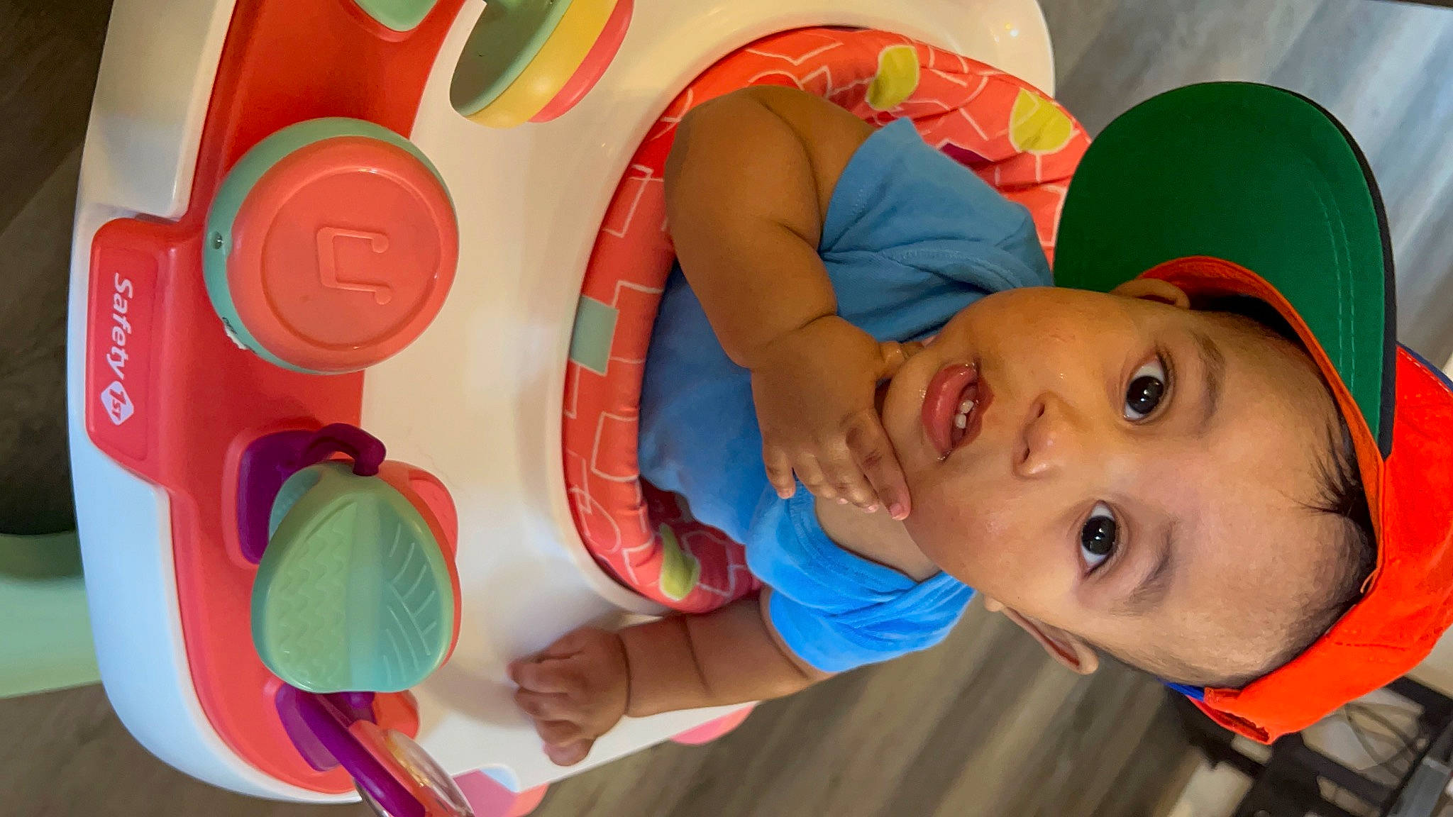 Kyle is registered to the contest to win money with this photo: baby, baby_playing_with_toys, baby_products, baby_toddler_clothing, child, circle, fun, happy, hat, leisure, orange, organ, person, plastic, play, product, recreation, room, toddler, toy