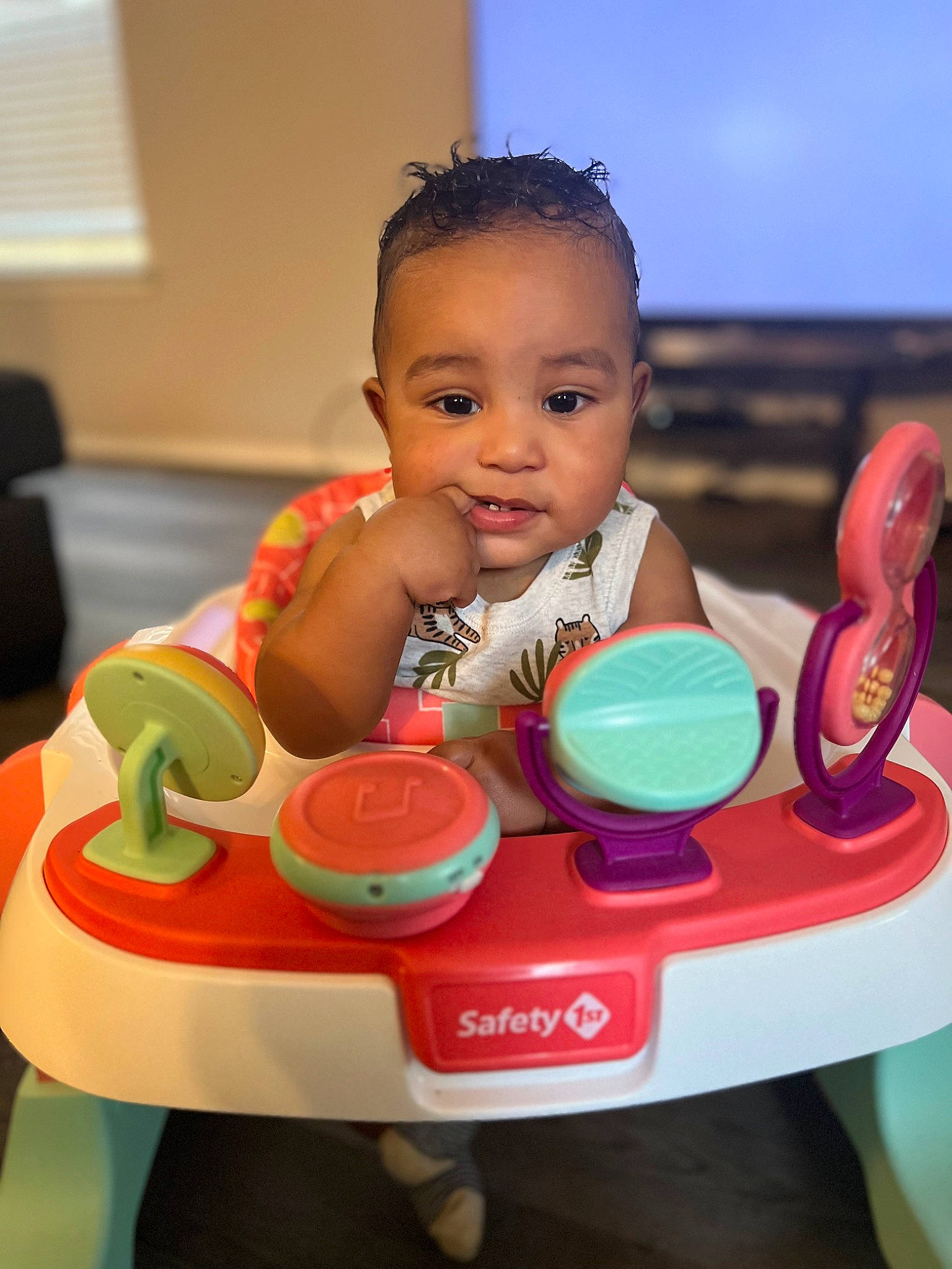 Kyle is registered to the contest to win money with this photo: baby, baby_playing_with_toys, baby_products, baby_toddler_clothing, baby_toys, cheek, child, facial_expression, fun, hairstyle, happy, head, person, plastic, riding_toy, sitting, skin, toddler, toy, toy_vehicle