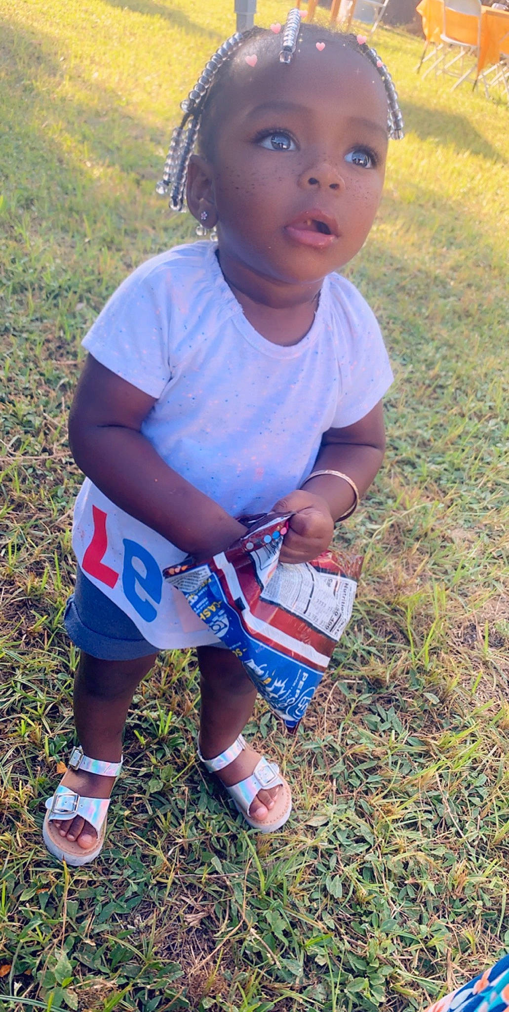 Loreal is registered to the contest to win money with this photo: adaptation, child, cool, grass, happy, person, play, smile, toddler