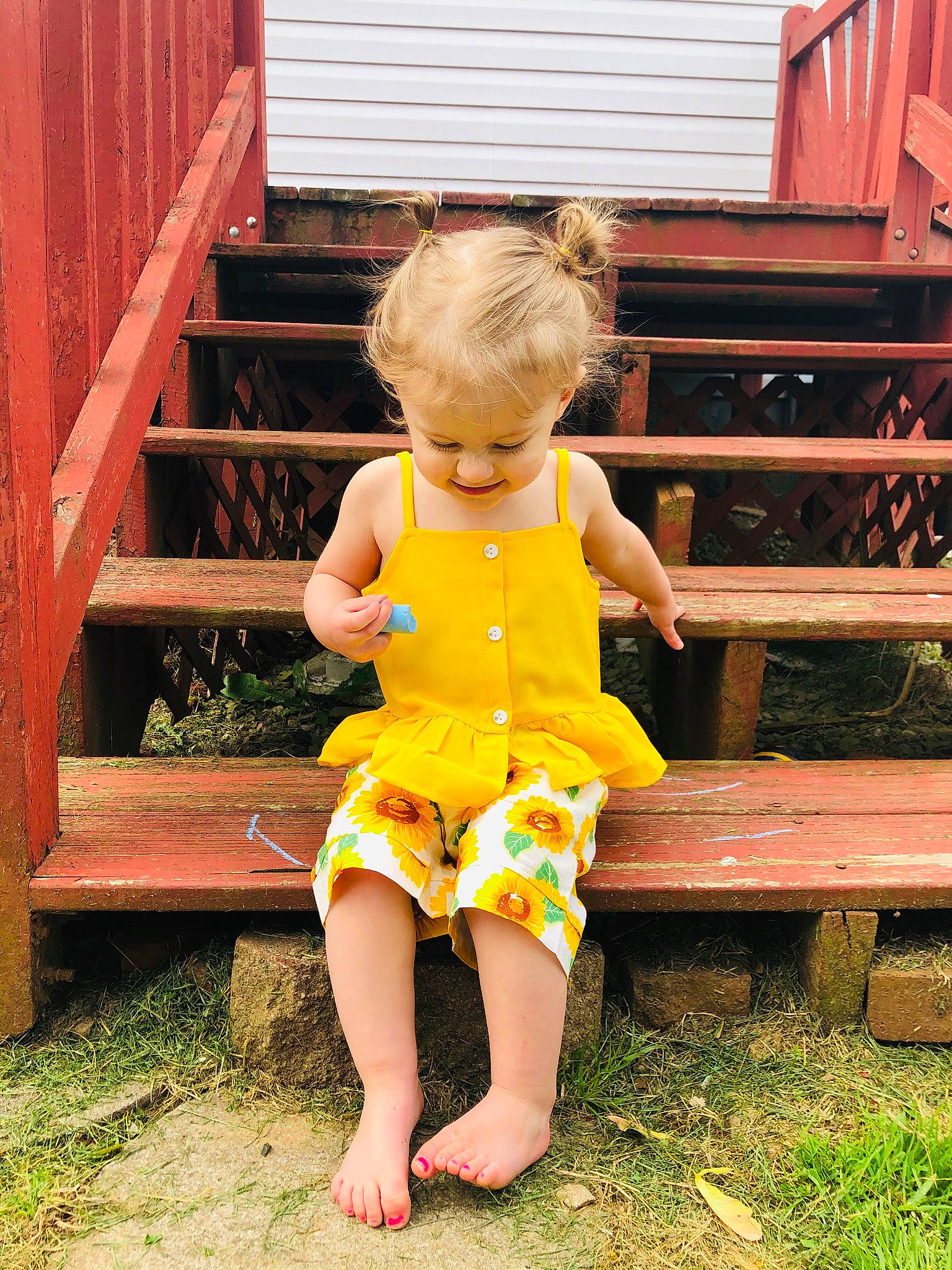 Emelia joined the competition — help win amazing prizes! baby_toddler_clothing, backyard, barefoot, child, dress, fun, grass, leg, pattern, person, play, shorts, sitting, smile, standing, summer, toddler, vacation, yard, yellow