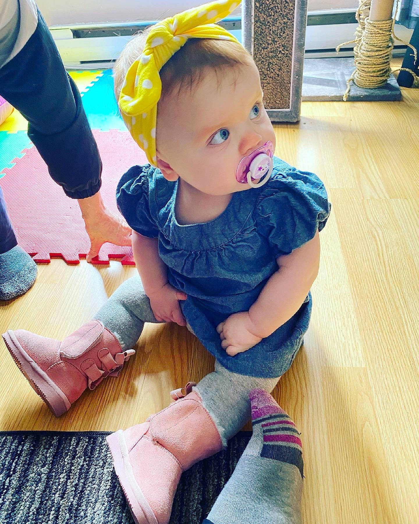 Karlee is registered to the contest to win money with this photo: baby, baby_toddler_clothing, child, comfort, electric_blue, floor, flooring, foot, happy, human_leg, joint, knee, person, skin, sleeve, sock, sportswear, standing, t_shirt, thigh