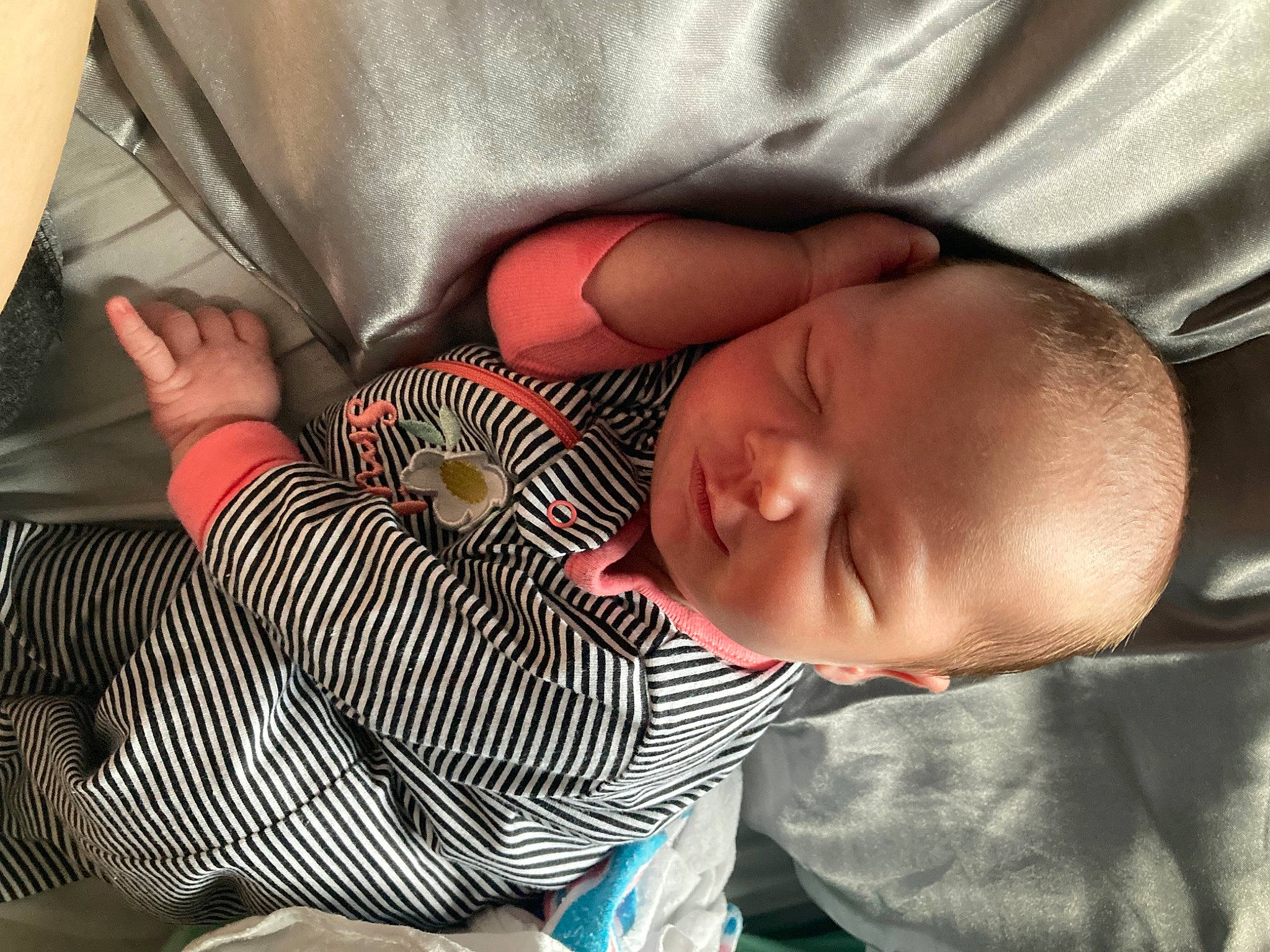 Alexandria is registered to the contest to win money with this photo: baby, baby_products, baby_sleeping, baby_toddler_clothing, cheek, child, comfort, ear, elbow, finger, hairstyle, linens, mouth, nose, person, product, skin, sleeve, textile, toddler