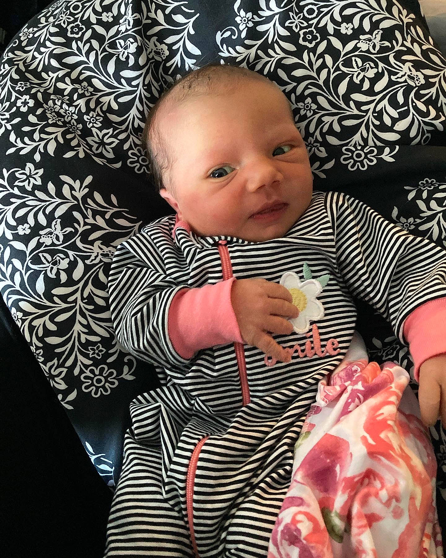 Alexandria is registered to the contest to win money with this photo: baby, baby_toddler_clothing, cheek, cool, dress, eye, facial_expression, flash_photography, hairstyle, head, human, human_body, iris, mouth, nose, person, pink, skin, sleeve, textile