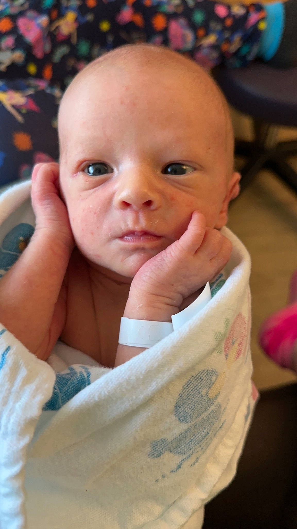 Malachai is registered to the contest to win money with this photo: baby, cheek, chin, comfort, ear, eyebrow, eyelash, finger, gesture, hand, happy, iris, lip, neck, nose, person, skin, sleeve, smile, thumb