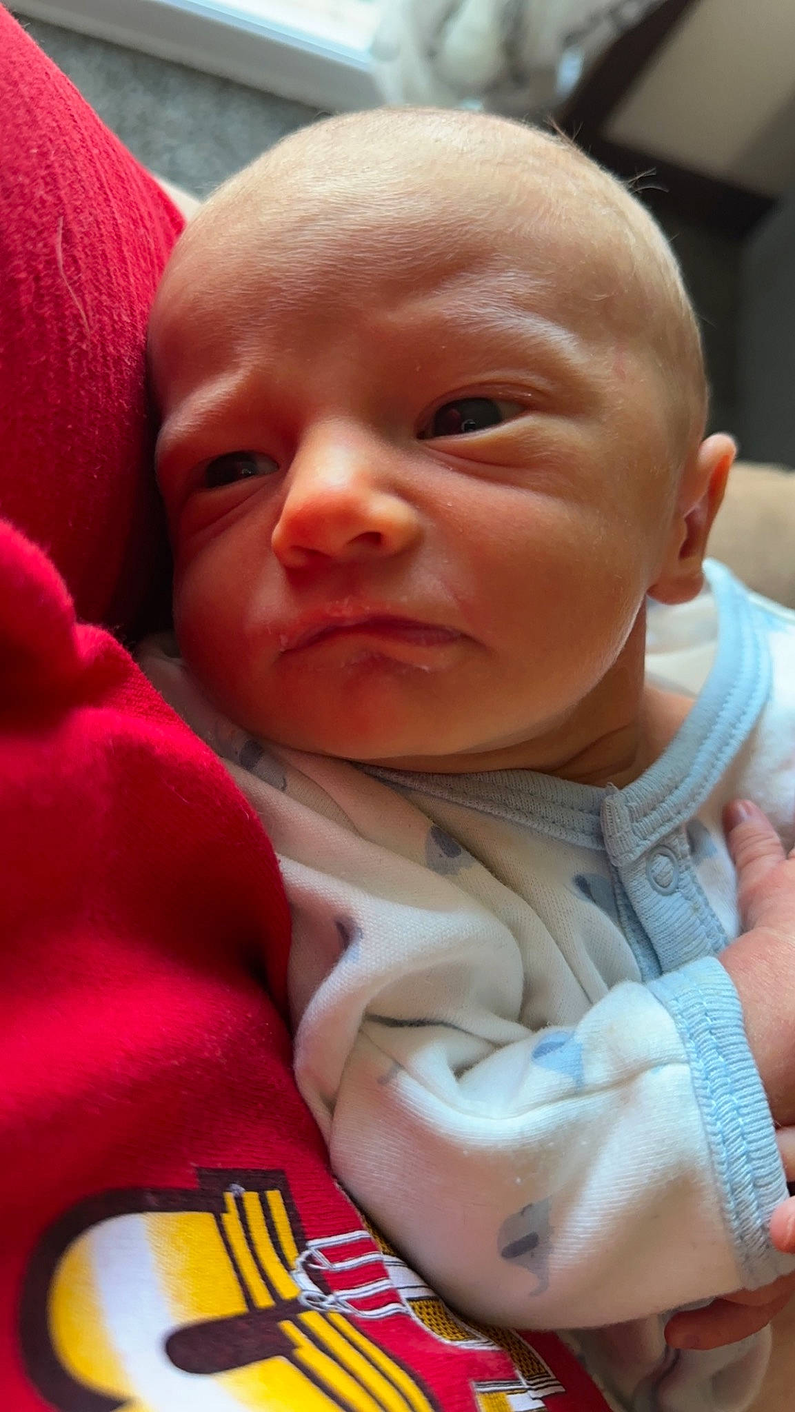 Malachai is registered to the contest to win money with this photo: baby, baby_toddler_clothing, cheek, chin, comfort, eyebrow, finger, happy, head, iris, lip, mammal, mouth, neck, nose, person, product, skin, sleeve, smile