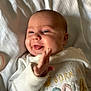 Ivy joined the competition — help win amazing prizes! baby, babylaughing, bed, bedroom, blanket, bodypart, face, finger, furniture, hand, happy, head, laughing, newborn, person, photography, portrait, quilt, smile, tape
