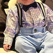 Cole joined the competition — help win amazing prizes! baby, child, smile, plaid_shirt, bow_tie, suspenders, blue_pants, sitting, indoor, cute, happy, infant, clothing, footwear, person, portrait, red_hair, toddler, carpet, hand