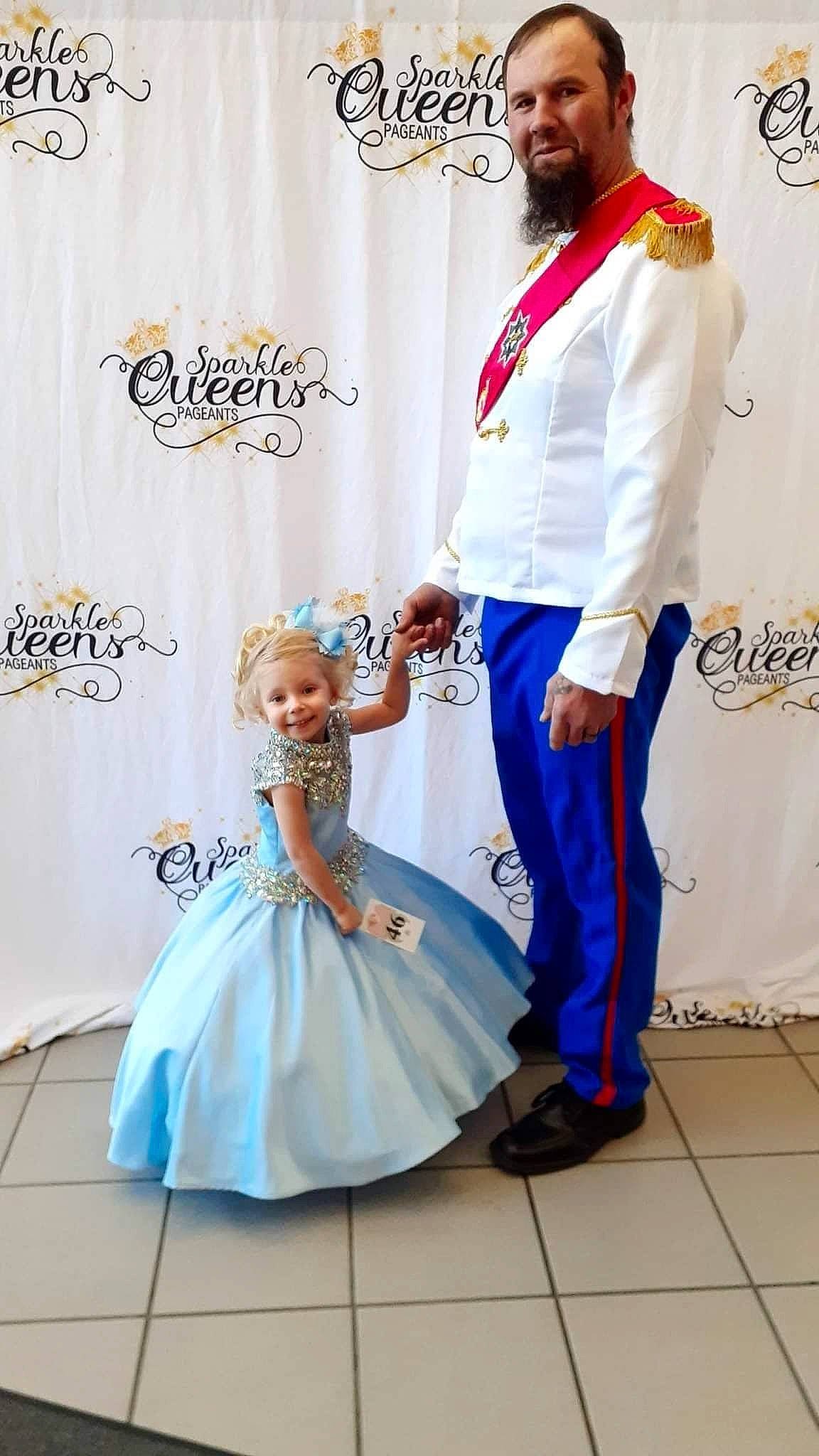 Kyliegh joined the competition — help win amazing prizes! beard, beauty, bridal_clothing, bridal_party_dress, dress, electric_blue, event, fashion_design, flooring, formal_wear, gown, hairstyle, happy, hat, joy, person, photograph, red, standing, style