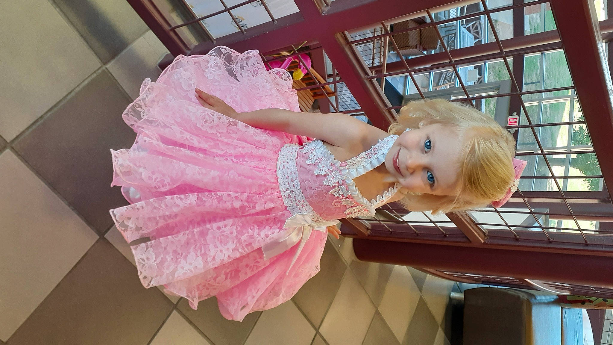 Kyliegh is registered to the contest to win money with this photo: beauty, child, dress, embellishment, event, fashion, fashion_design, fun, gown, hairstyle, happy, joy, leisure, magenta, peach, person, pink, ruffle, skin, smile