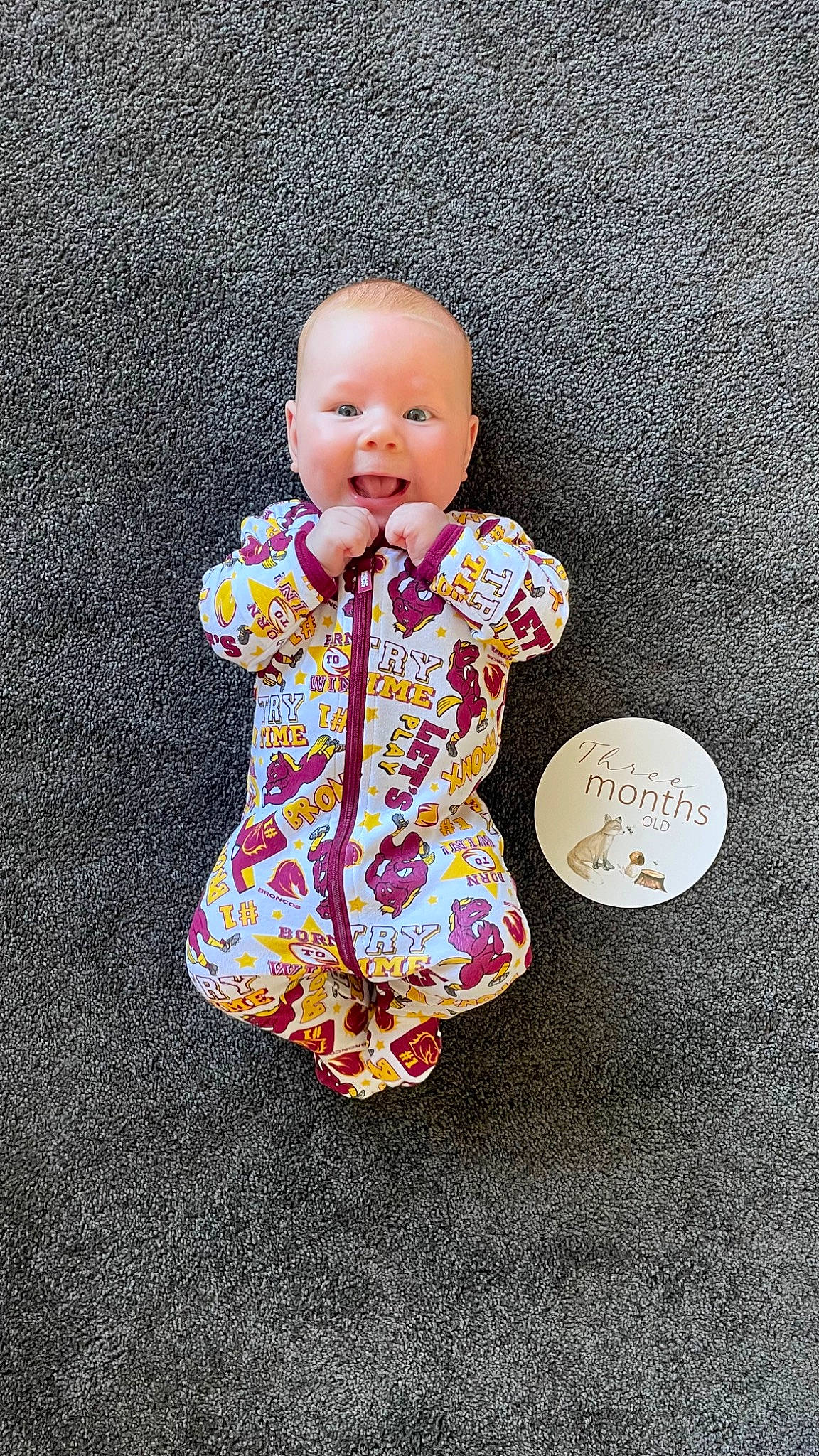 Jax is registered to the contest to win money with this photo: art, baby, baby_toddler_clothing, baby_toys, cheek, child, doll, dress, gesture, hand, happy, human_body, magenta, pattern, people_in_nature, person, pink, sitting, sleeve, toddler