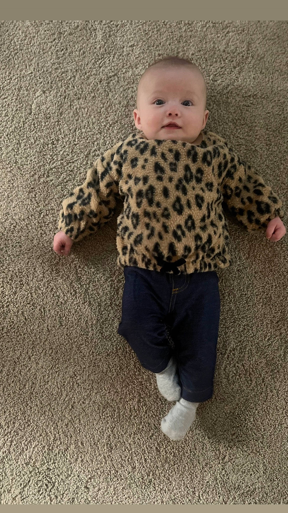 Madelyn joined the competition — help win amazing prizes! baby, baby_toddler_clothing, baby_toys, child, comfort, flooring, head, knitting, pattern, person, play, sitting, skin, sleeve, t_shirt, toddler, toy, wood, wool, woolen