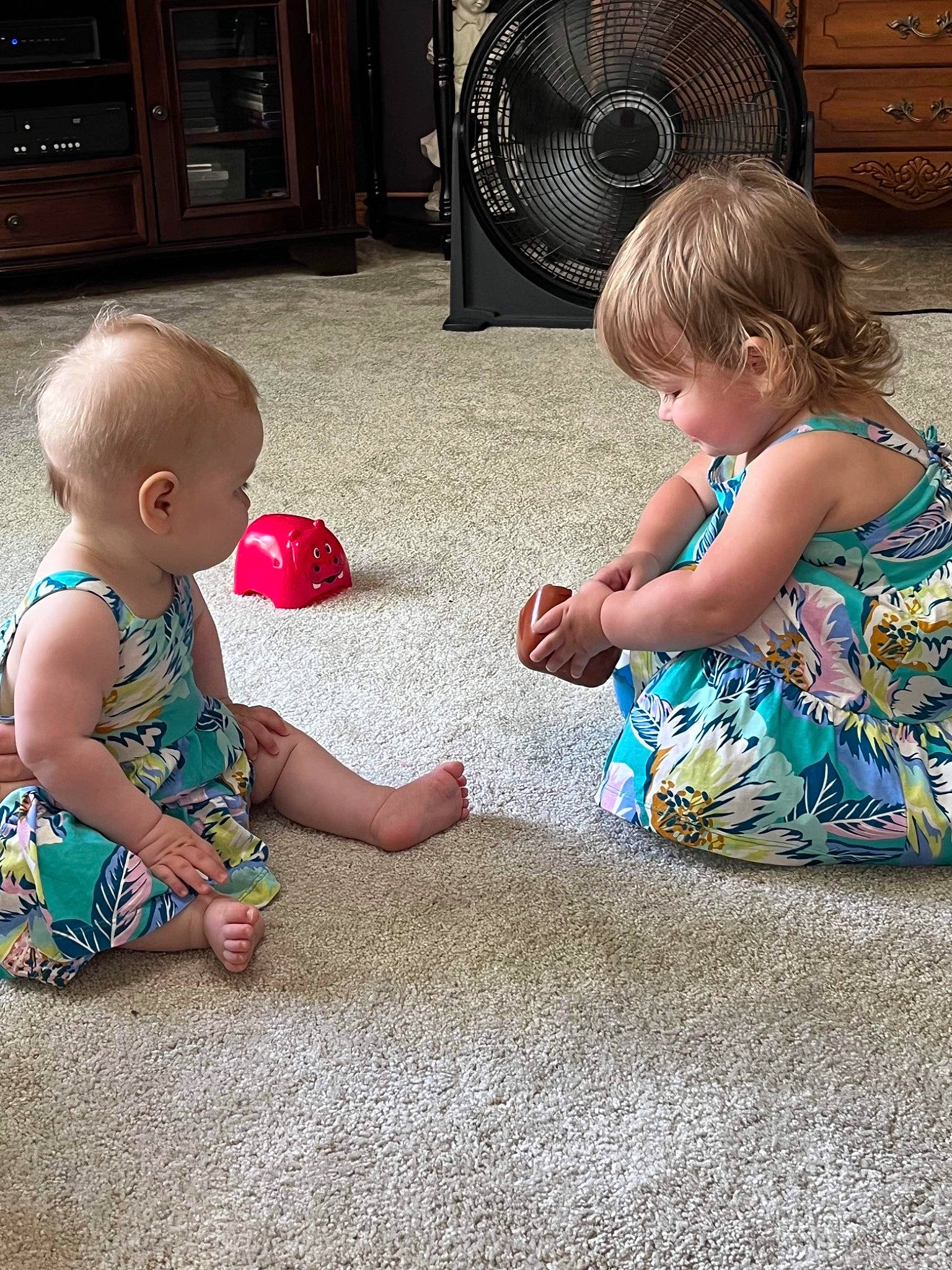 Gianna joined the competition — help win amazing prizes! automotive_tire, baby, baby_toddler_clothing, child, floor, flooring, fun, grass, happy, home_appliance, lap, leisure, mechanical_fan, person, play, room, sharing, sitting, toddler, toy