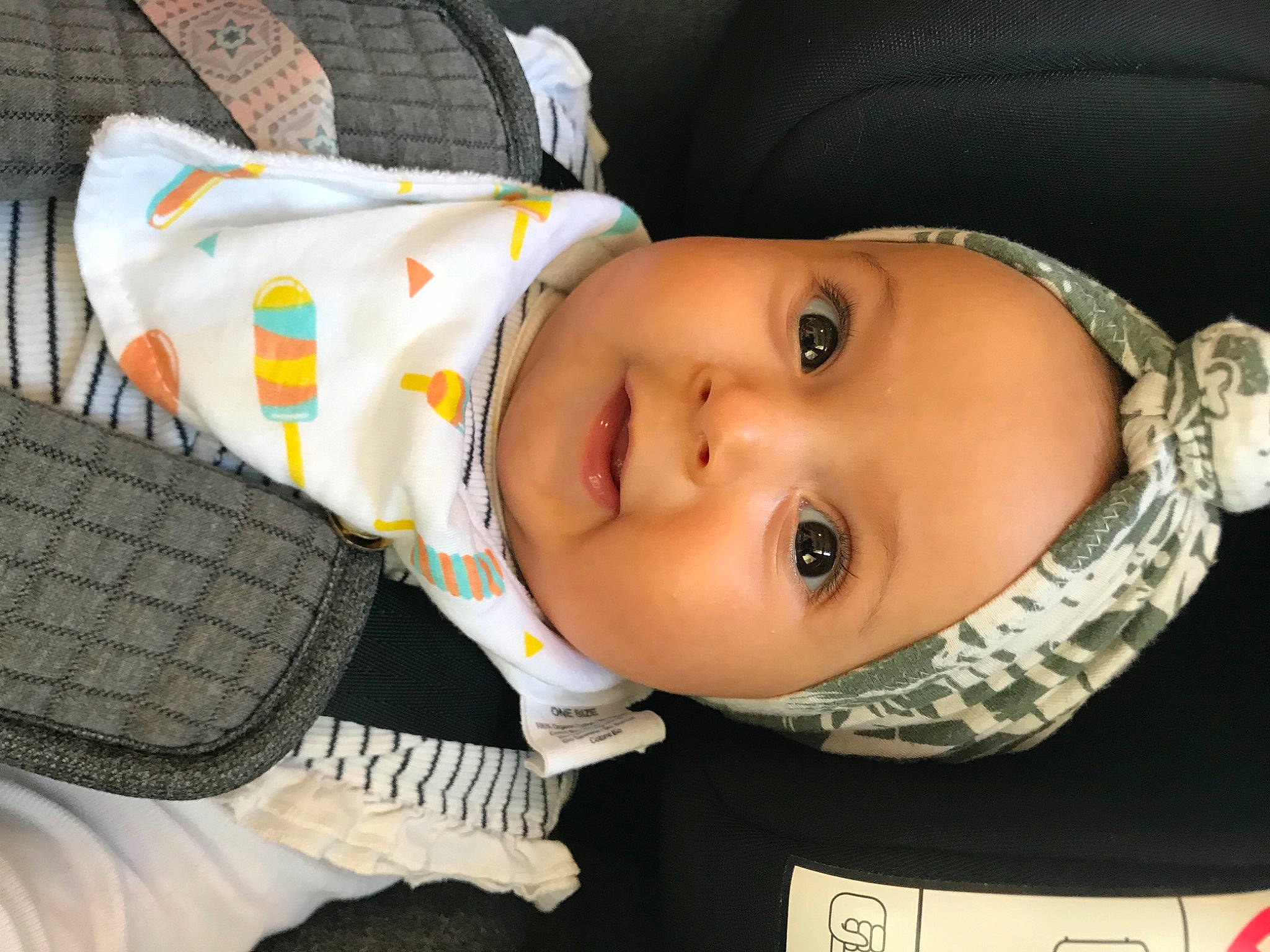 Aria participe au concours pour gagner de l'argent avec cette photo : automotive_tire, baby, baby_toddler_clothing, beauty, cheek, child, cool, eyelash, facial_expression, headgear, headwear, lip, mouth, nose, organ, person, skin, tire, toddler, tread