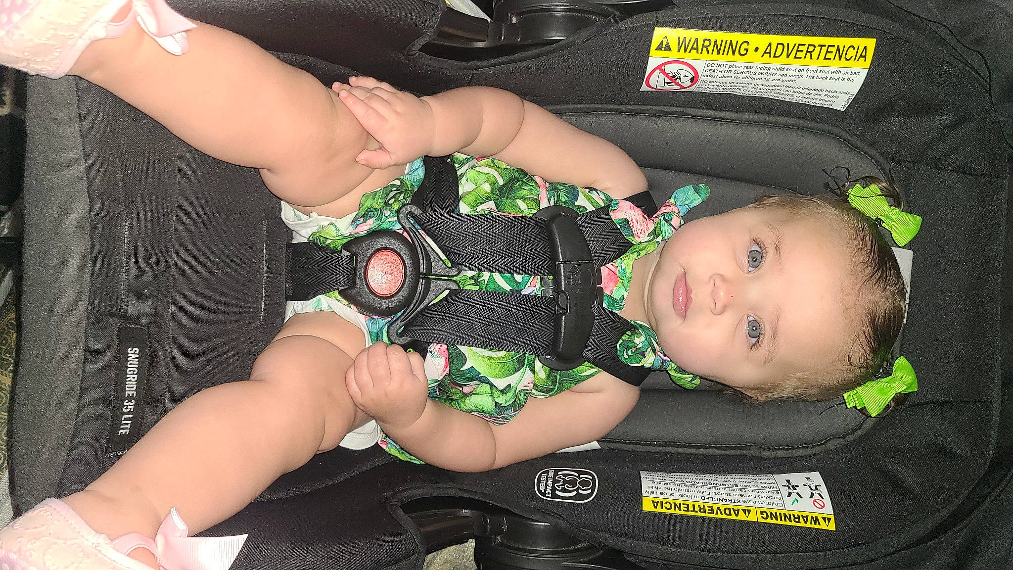 Aliyah is registered to the contest to win money with this photo: auto_part, baby, baby_carriage, baby_products, baby_safety, baby_toddler_clothing, bag, child, comfort, fashion_accessory, gesture, nail, pattern, person, personal_protective_equipment, sitting, strap, thigh, thumb, toddler