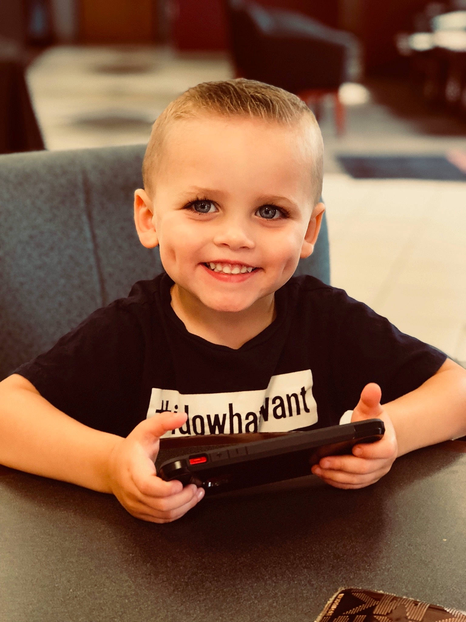 Vincent is registered to the contest to win money with this photo: child, chocolate, finger, food, joy, person, smile, t_shirt, toddler