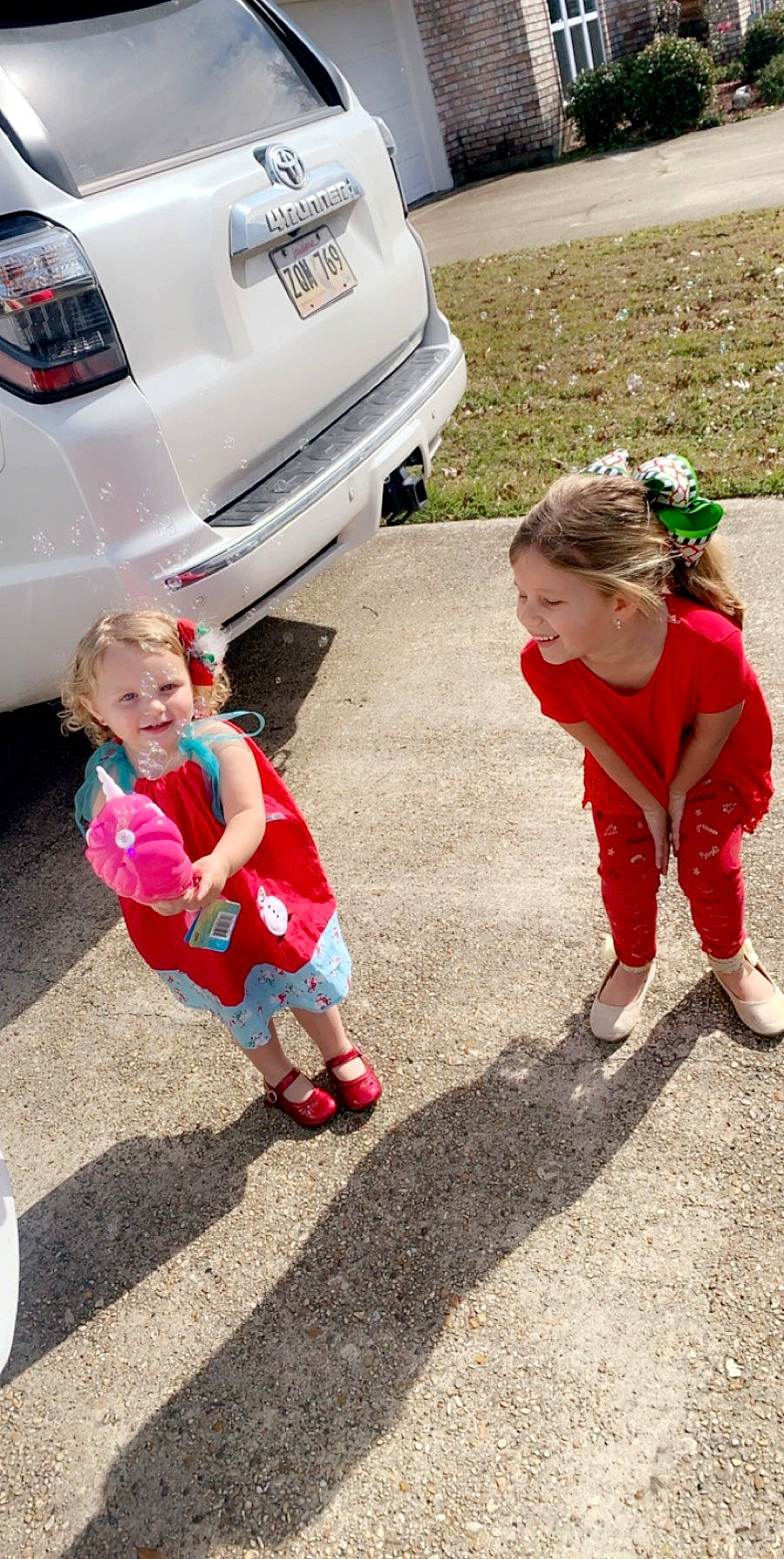 Evalynn joined the competition — help win amazing prizes! asphalt, bumper, car, child, city_car, compact_car, family_car, joy, luxury_vehicle, person, plant, play, red, sport_utility_vehicle, subcompact_car, toddler, vehicle, vehicle_door