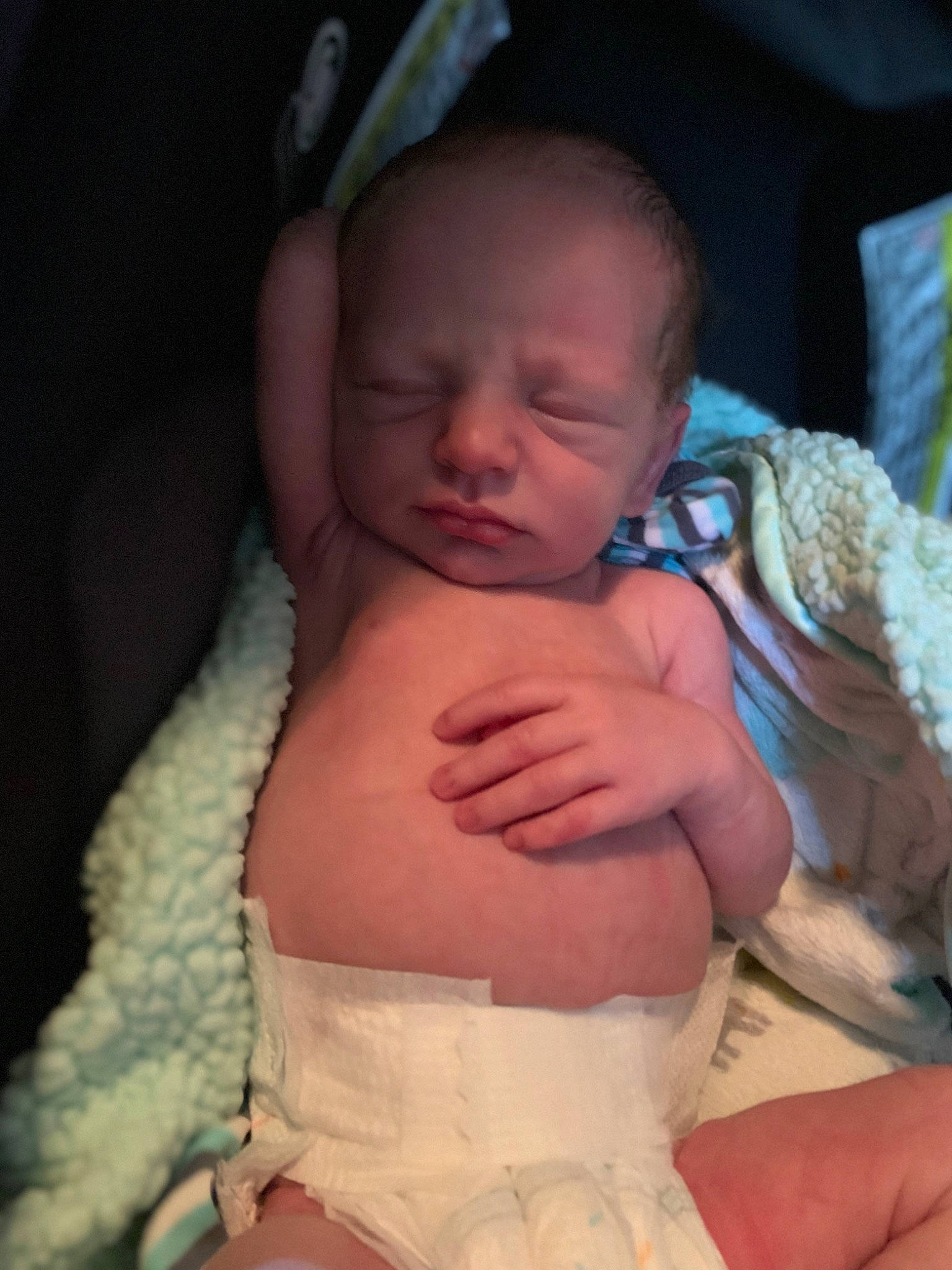 Canaan is registered to the contest to win money with this photo: baby, cheek, chin, comfort, ear, eye, facial_expression, finger, hand, head, headgear, human_body, lip, mouth, neck, nose, person, pink, skin, sorrow