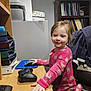 Emalee joined the competition — help win amazing prizes! books, casual, child, clothing, computer_mouse, desk, folders, furniture, game_controller, happy, home, indoor, office, pajamas, person, shelf, smiling, technology, toddler, wooden_surface