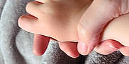 Emalee joined the competition — help win amazing prizes! adult, blanket, bodypart, care, child, closeup, comfort, connection, fingers, foot, hand, holding, human, nurture, skin, soft, texture, toes, touch, warmth
