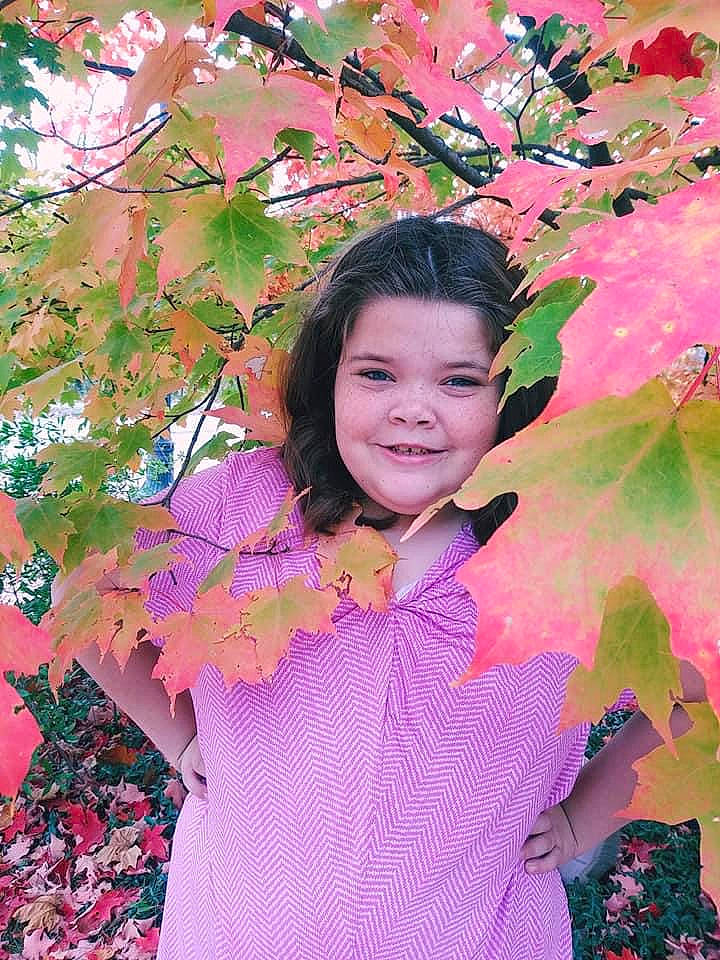 Hannah is registered to the contest to win money with this photo: autumn, beauty, blossom, botany, costume, flower, happy, joy, leaf, person, photography, pink, plant, smile, spring, tree