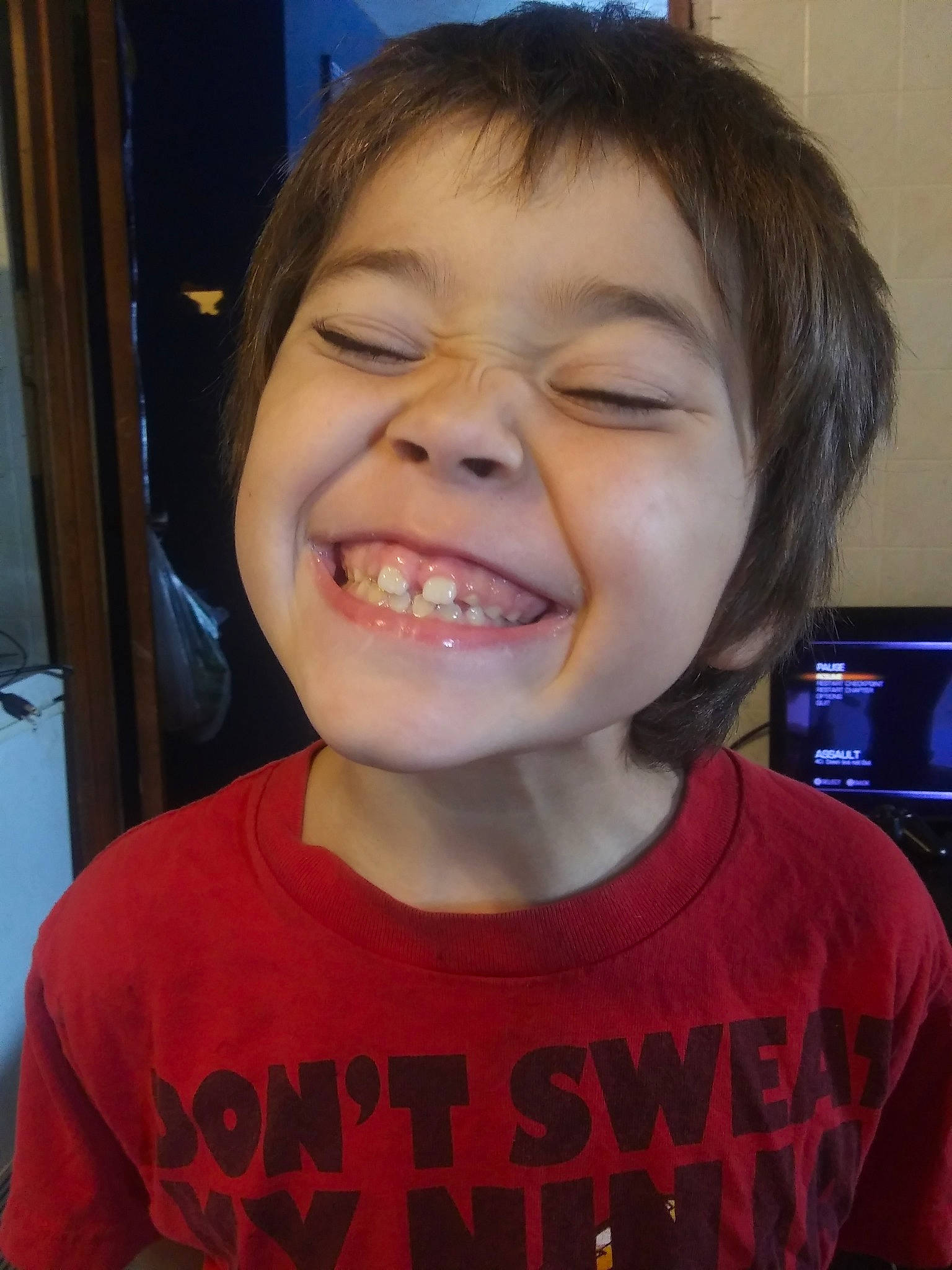 Dean is registered to the contest to win money with this photo: cheek, child, chin, face, facial_expression, forehead, fun, head, human_body, jaw, joy, laugh, lip, mouth, nose, organ, person, smile, tongue, tooth