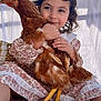 child, girl, chicken, animal, pet, hug, floral_dress, curly_hair, smile, outdoor, white_background, yellow_legs, feathers, cute, portrait, sitting, basket, natural_light, happy, closeup