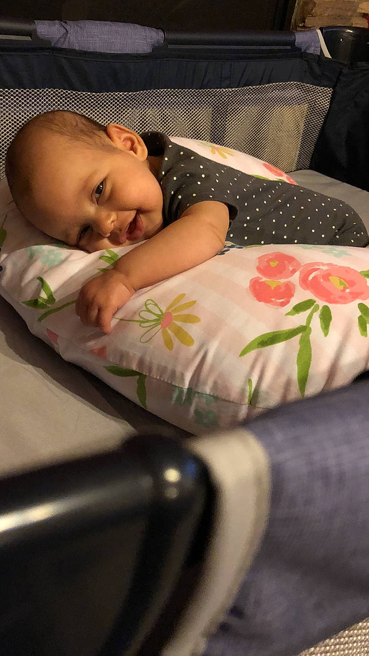 Emilie is registered to the contest to win money with this photo: bedtime, child, finger, girl, infant, product, sitting, sleep, textile, toddler