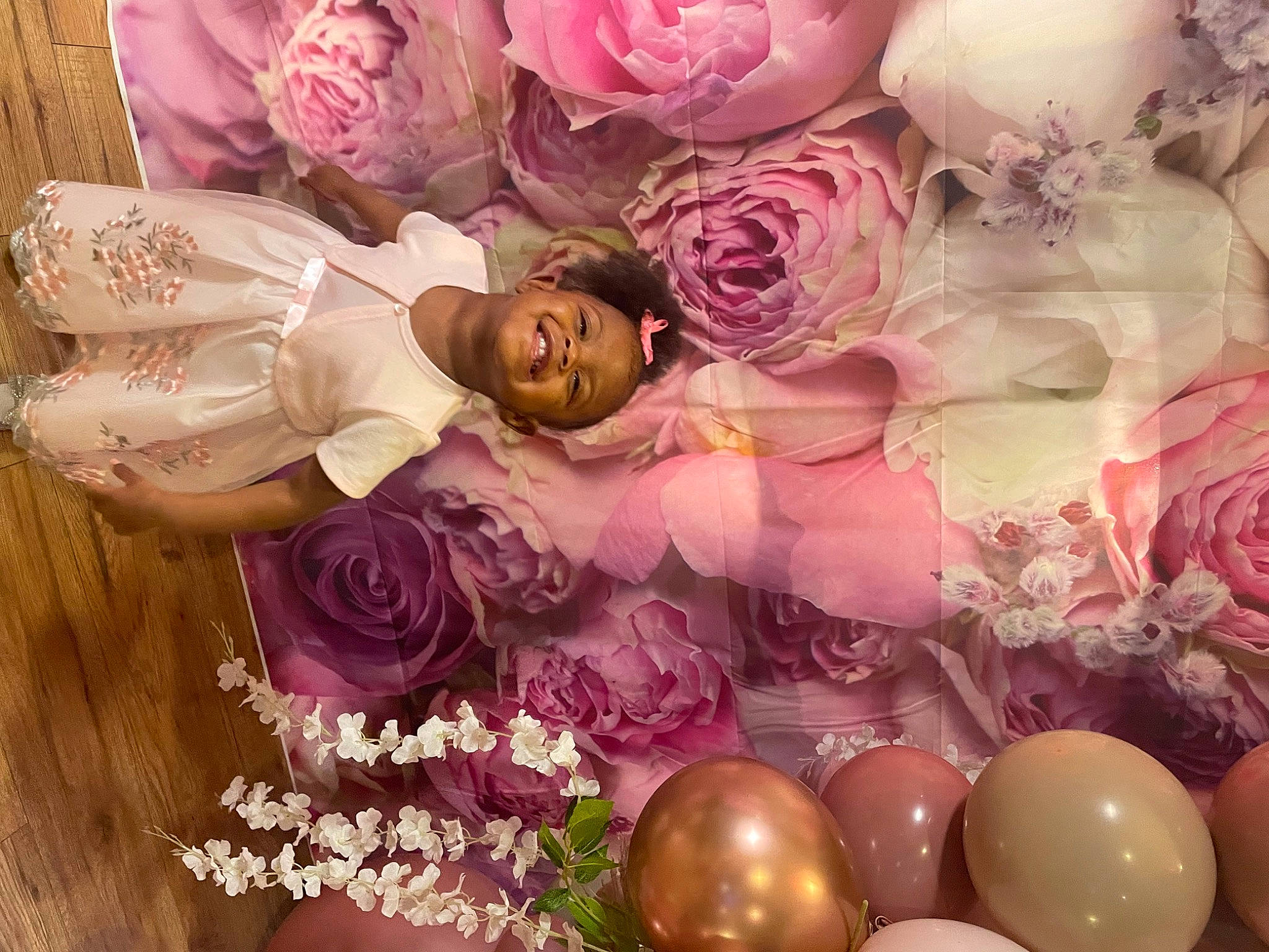 Ryan joined the competition — help win amazing prizes! artificial_flower, balloon, beauty, bouquet, event, flower, flower_arranging, garden_roses, happy, joy, magenta, material_property, person, petal, pink, plant, purple, rose, rose_family, smile