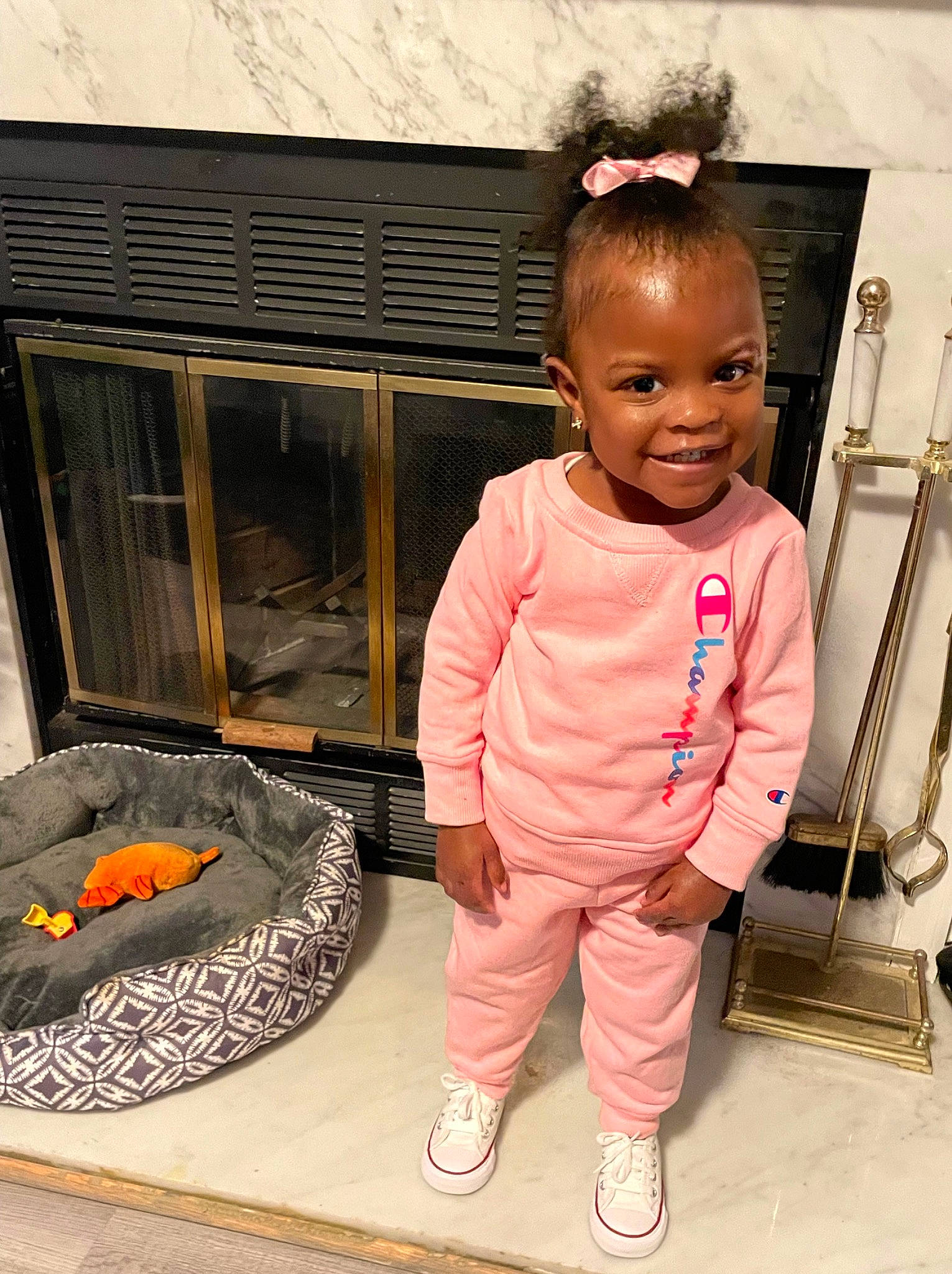 Ryan is registered to the contest to win money with this photo: baby, baby_toddler_clothing, bag, cheek, child, door, eye, flooring, fun, happy, hardwood, joy, magenta, person, pink, room, sitting, skin, sleeve, smile